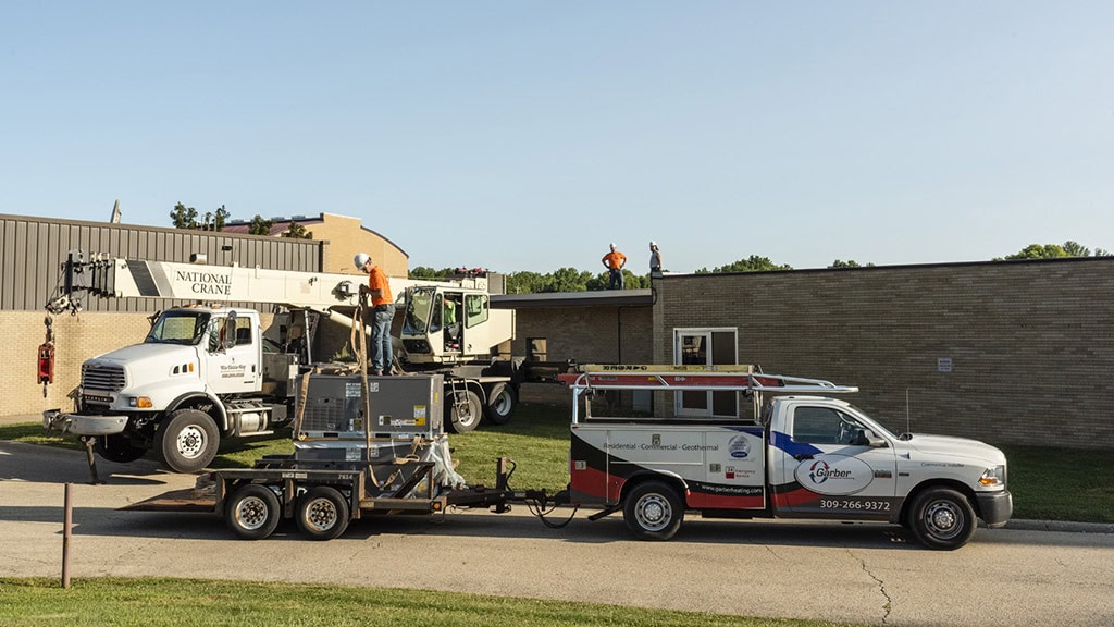 Garber Heating & Air Conditioning performing an installation.
