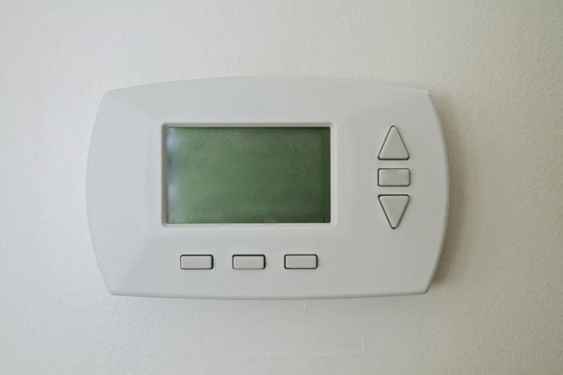 Think HVAC During Your Home Remodeling. Blank space on screen of thermometer.